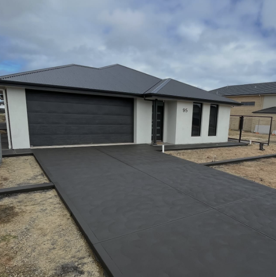Charcoal coloured driveway