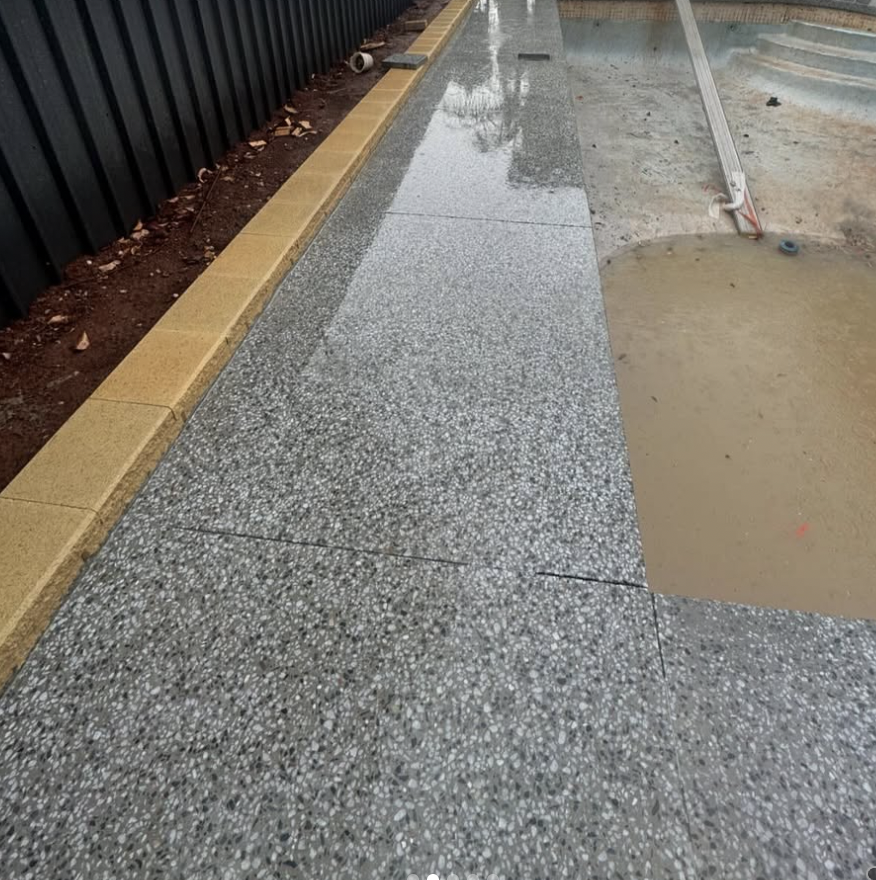 Honed concrete pool surround