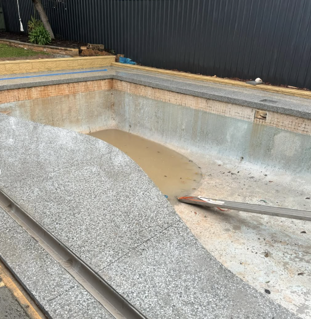 Honed concrete pool surround